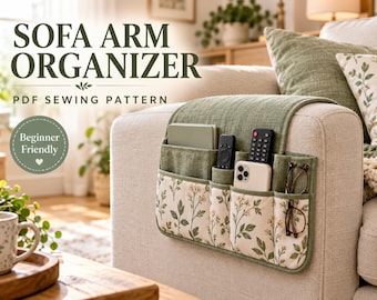 May include: A sage green sofa arm organizer featuring multiple pockets, including a floral patterned section. The text reads SOFA ARM ORGANIZER PDF SEWING PATTERN and Beginner Friendly. It holds a smartphone, two remote controls, and glasses.