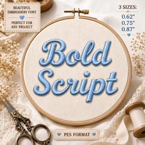 May include: A wooden embroidery hoop containing light blue embroidered text that reads Bold Script. The text is available in three sizes: 0.62 inches, 0.75 inches, and 0.87 inches. The design is provided in PES format for digital embroidery projects.