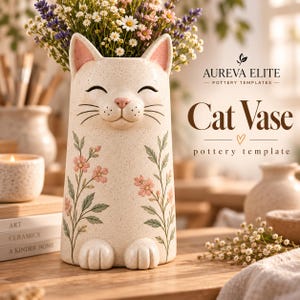 Może przedstawiać: Kremowy ceramiczny wazon w kształcie kota z nakrapianym wykończeniem, uśmiechniętym kocim pyszczkiem, różowymi uszami i namalowanymi różowymi łodygami kwiatów. Widoczny jest tekst "AUREVA ELITE POTTERY TEMPLATES Cat Vase pottery template".