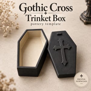 May include: A black coffin-shaped trinket box with a beige interior and a matching lid featuring a raised cross. The text reads Gothic Cross Trinket Box pottery template and Digital Download. The box has a matte finish and a simple geometric design.