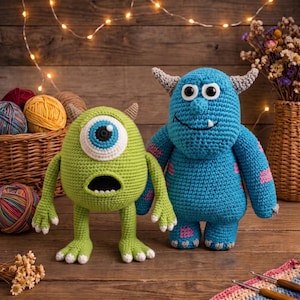 May include: Two handmade crochet plush toys. One is a round, lime green creature with a single large central eye, small horns, and a wide open mouth. The other is a tall, blue creature with purple spots, two horns, and a wide, toothy smile.