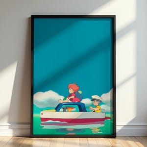 May include: A framed wall art print featuring a cartoon illustration of a small boat on turquoise water. A red-haired character sits on the roof of the boat while a character in a yellow shirt and white cap steers the vessel under a blue sky.