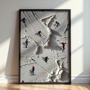 May include: A framed vertical wall art piece featuring a textured white impasto background that mimics snow, with several small figures of skiers in colorful outfits scattered across the surface, each depicted in various skiing poses and positions.