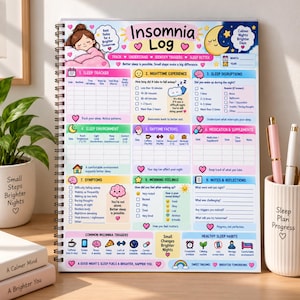 May include: A spiral-bound Insomnia Log planner featuring sections for sleep tracking, nighttime experiences, disruptions, environment, daytime factors, medication, symptoms, morning feelings, and notes. The page includes colorful illustrations of a sleeping person, a moon, and various icons with text prompts to record daily sleep habits and triggers.
