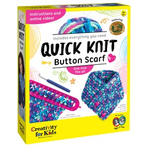 May include: A Quick Knit Button Scarf craft kit box featuring a blue and pink yarn ball, a blue knitting hook, a pink plastic loom, and a finished multi-colored knit scarf with two pink heart buttons. The box displays text and dimensions.