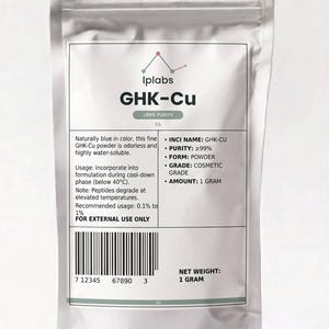 May include: A silver-coloured, resealable pouch containing 1 gram of GHK-Cu powder. The label features the Iplabs logo, states a purity of 99%, and includes technical usage instructions, a barcode, and the text FOR EXTERNAL USE ONLY.