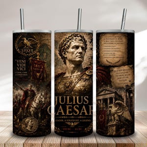 May include: A cylindrical tumbler with a straw featuring a Julius Caesar theme. The design includes a portrait of Caesar, the text 'JULIUS CAESAR', 'VENI VIDI VICI', 'SPQR', historical quotes, a Roman eagle, a horse-mounted soldier, and architectural elements.