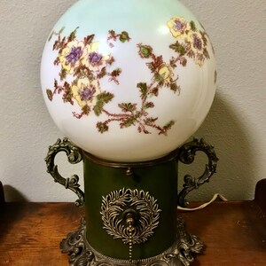 Antique double sale globe parlor lamps