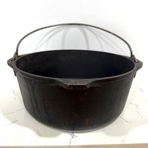 May include: A rustic wooden sign with the text "Welcome to our home" in a handwritten style. The sign features a distressed finish and a simple, inviting design, perfect for a front porch or entryway.