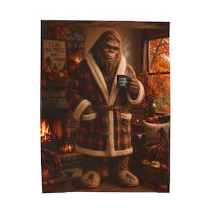 May include: A furry creature wearing a red and black plaid robe with a cream-coloured sherpa lining and matching slippers. The creature holds a black mug with the text COFFEE FORESTS HOPE. A sign reads I LIKE BIG TREES AND I CANNOT LIE.