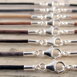 Leather necklace with sterling silver clasps and cord ends. Colored using natural dyes.
