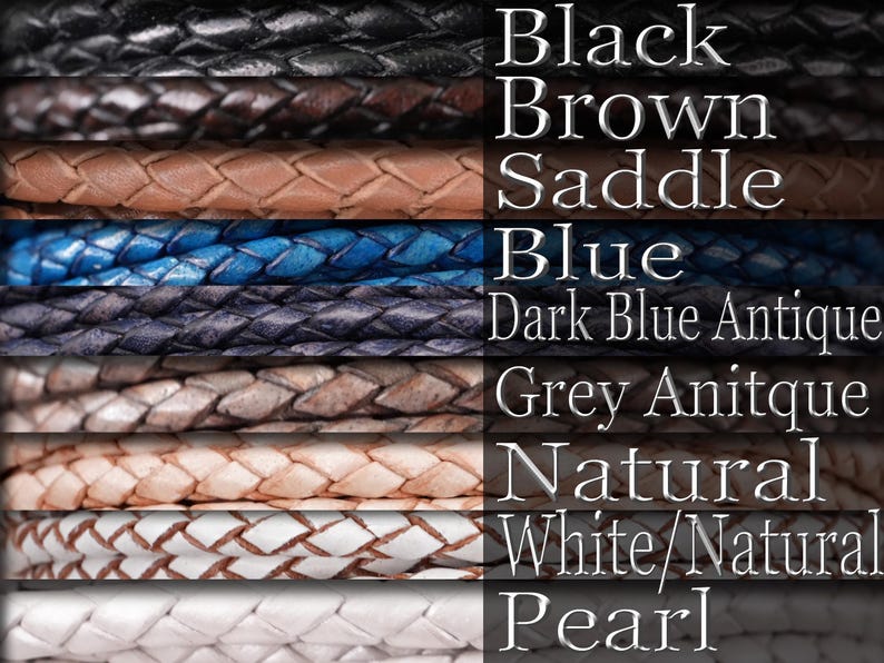 A display of leather necklaces labeled with colors. Black, brown, saddle, blue, dark blue antique, grey antique, natural, white/natural and pearl.