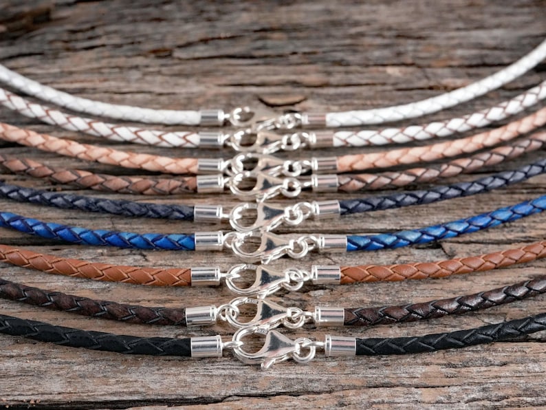 Genuine braided leather necklace with solid sterling silver clasps.