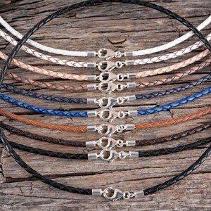An overview of leather necklace colors along with a round black leather necklace in the center.