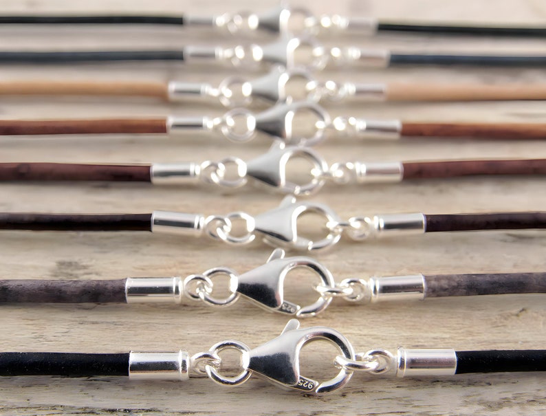 Leather necklace with sterling silver clasps and cord ends. Colored using natural dyes.