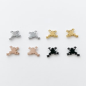 May include: Eight metal frog charms in different colours: silver, gold, rose gold, and black. The charms are all the same size and shape, and they are perfect for adding a touch of whimsy to jewellery or crafts.