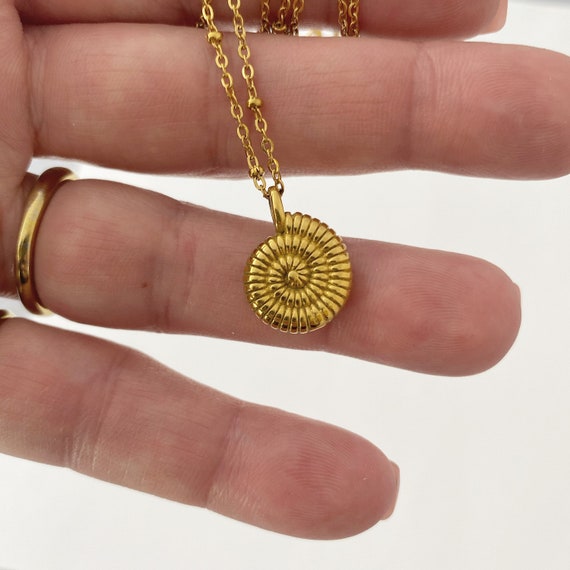 Gold seashell necklace clearance