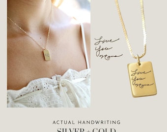 May include: A gold-colored rectangular pendant necklace with the handwritten text "Love You Ortona". The necklace is displayed on a model and also shown separately. The image includes the text "ACTUAL HANDWRITING SILVER + GOLD".