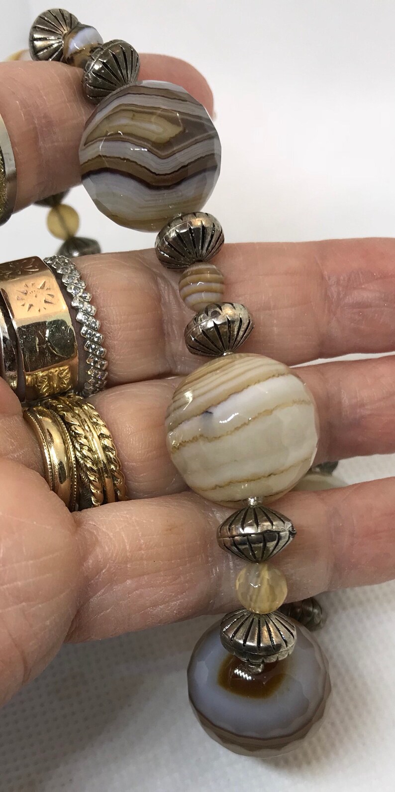 3 oz banded 3692 17 grms honeycomb faceted agate bead necklace 17mm beads 17 long