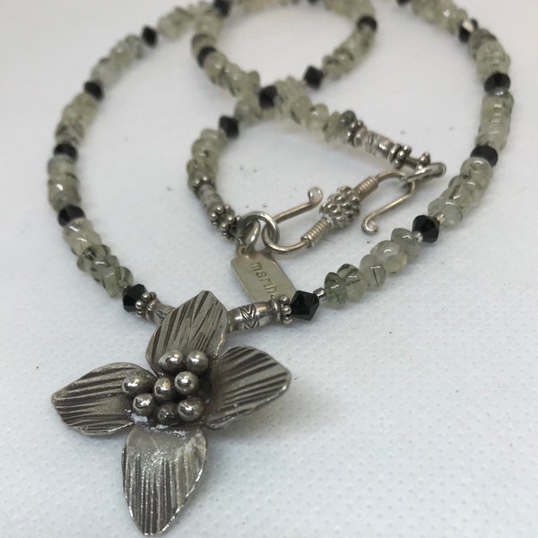 Jewelry by martha, rutilated quartz, with beautiful sterling. The black rutilation is black tourmaline. 18” long, 4mm beads.  3781