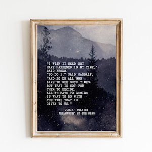 May include: A framed wall art print featuring a dark, moody landscape of mountains and pine trees at night. The text reads: I WISH IT NEED NOT HAVE HAPPENED IN MY TIME. SAID FRODO. SO DO I, SAID GANDALF. ALL WE HAVE TO DECIDE IS WHAT TO DO WITH THE TIME THAT IS GIVEN TO US. J.R.R. TOLKIEN FELLOWSHIP OF THE RING.