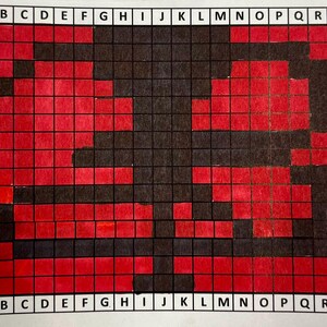 May include: A red and black grid pattern with a black cross shape in the centre. The grid is labelled with letters A through S and numbers 1 through 15.