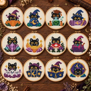 May include: Twelve circular wooden embroidery hoops containing cross-stitch patterns of black cats in various magical themes, including pumpkins, potions, mushrooms, crystals, and celestial motifs, all displayed on a dark wooden surface.