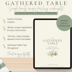May include: A 77-page digital family cookbook titled The Gathered Table, featuring simple family recipes for busy weeknights. The tablet displays the cover with olive illustrations, and the text lists features like family-friendly recipes, whole ingredients, and easy instructions for dinners, sides, breads, desserts, and marinades.