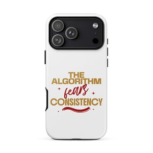 May include: A white smartphone case featuring the gold text THE ALGORITHM and CONSISTENCY, with the word fears in a red script font. The design includes small red star accents and a red horizontal brush stroke underneath the text.