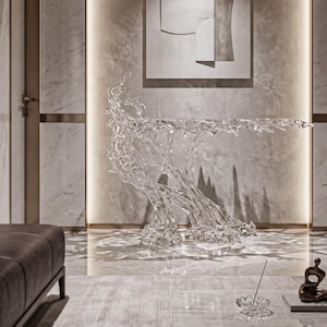 May include: A clear, transparent console table featuring a complex, organic, branch-like structure that supports a flat top surface. The design mimics the appearance of flowing liquid or intertwined tree roots, creating intricate light refractions.