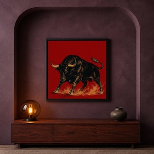 May include: A square wall art print featuring a detailed black illustration of a charging bull with golden horns and hooves, set against a solid deep red background, enclosed within a thin black frame, displayed as a piece of home decor.