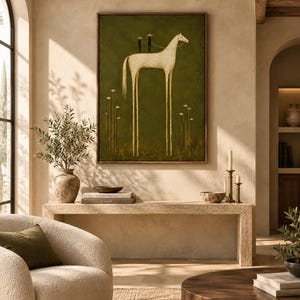 May include: A rectangular wall art piece featuring a tall, slender white horse with long legs standing in a dark olive green field. Two small dark figures with wide-brimmed hats stand on the horse's back. Thin, delicate white flowers grow below.
