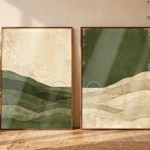 Puede incluir: Dos láminas de arte mural rectangulares con diseños de paisajes abstractos. La lámina izquierda muestra colinas verdes superpuestas sobre un cielo crema con un arco solar. La derecha muestra un cielo verde oscuro sobre colinas color crema.