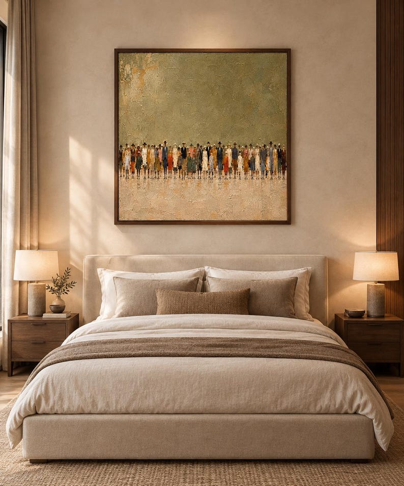 May include: A square framed wall art piece featuring a textured olive green background above a sandy beige foreground, depicting a dense horizontal line of small, abstract figures dressed in varied colorful clothing and dark hats.