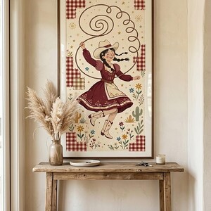 Framed cowgirl wall art in an entryway above a rustic wooden console table — western folk art print, tall printable decor