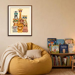 May include: A framed wall art print featuring a group of cartoon animals including a zebra, giraffe, leopard, tiger, monkey, lion, elephant, and hippo, all wearing colorful sunglasses, displayed in a room with a yellow beanbag chair.