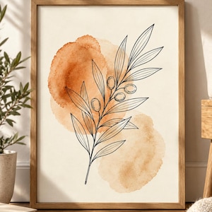 May include: A framed wall art print featuring a black line drawing of an olive branch with leaves and small fruits centered over two overlapping watercolor circles in shades of burnt orange and light tan on a cream-colored background.