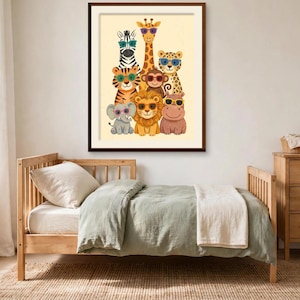 May include: A framed wall art print featuring a group of cartoon animals including a zebra, giraffe, tiger, monkey, leopard, lion, elephant, and hippo. Each animal wears colorful sunglasses against a light cream background.