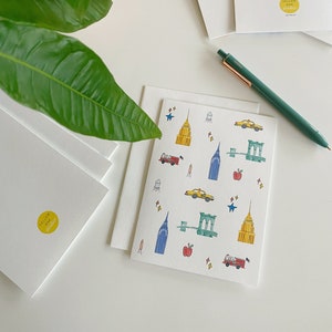 Things we love about New York, Blank Greeting Card, NYC themed with taxi, Empire State, Chrysler Building, Brooklyn Bridge and water towers