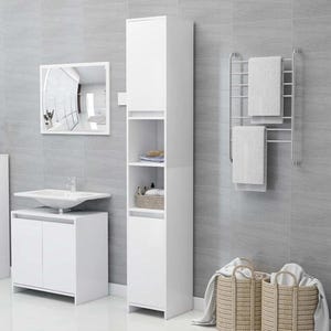 May include: A tall white bathroom cabinet with two closed doors and two open shelves, positioned next to a white vanity with a sink, a wall-mounted towel rack with two white towels, a rectangular mirror, and two woven baskets on the floor.