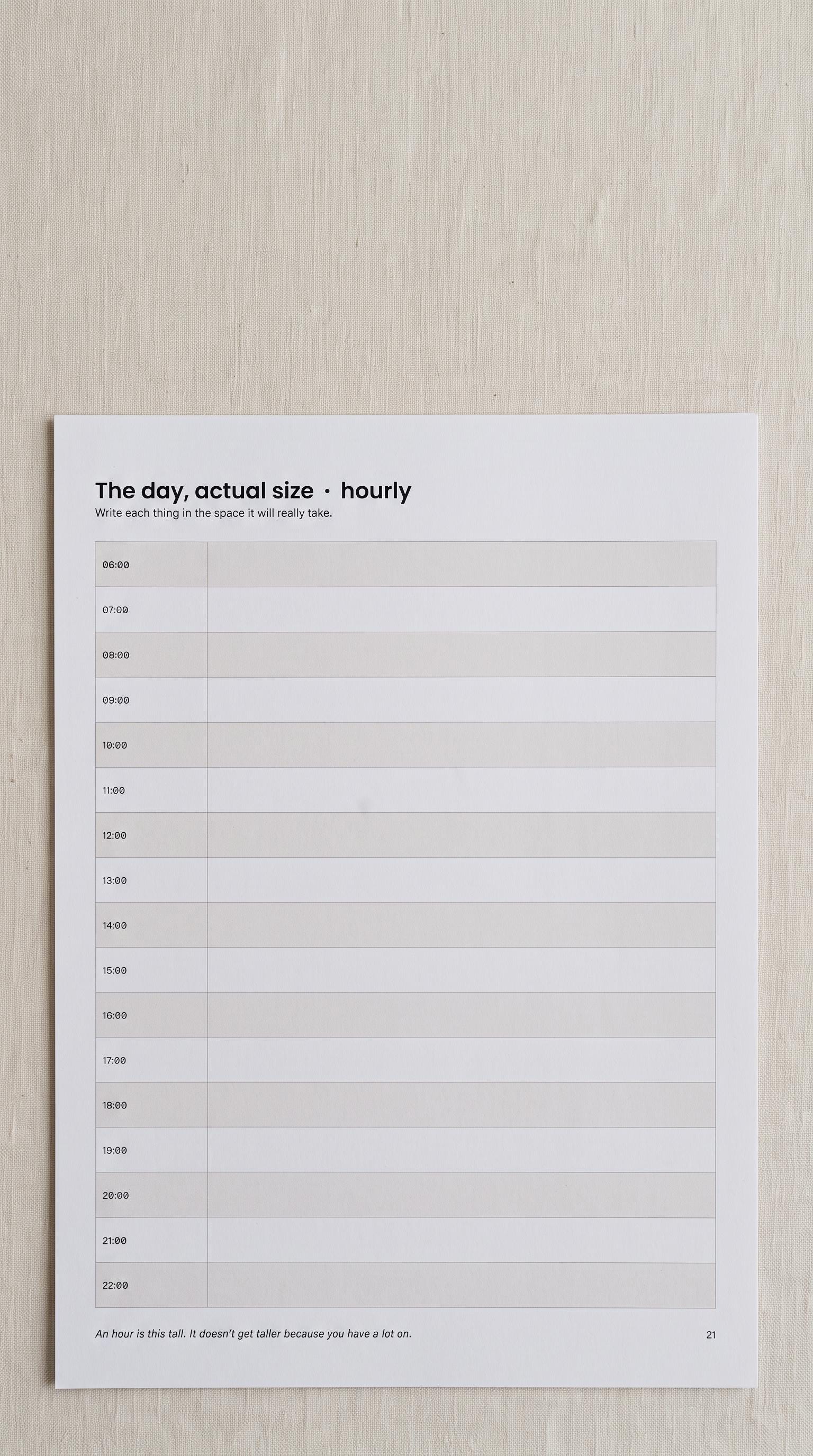 The Day actual-size hourly schedule with equal-height rows from 06:00 to 22:00