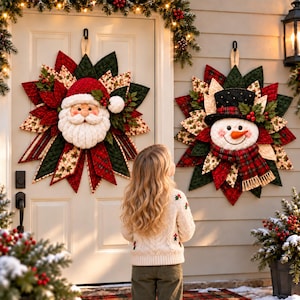 May include: Two quilted fabric wall hangings shaped like starbursts. One features a Santa Claus face with a red hat, the other a snowman with a black top hat and plaid scarf. Both are decorated with red berries and green holly leaves.