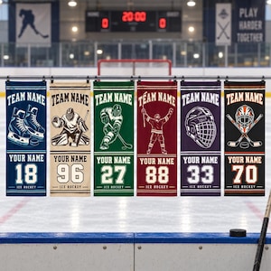 May include: Six vertical ice hockey banners in blue, beige, green, maroon, purple, and black. Each banner features the text TEAM NAME, YOUR NAME, and ICE HOCKEY, along with unique graphics of skates, a goalie, a player, a helmet, and sticks.