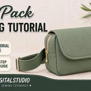 Może przedstawiać: Szałwiowo-zielona nerka z klapką, złotym zamkiem błyskawicznym i regulowanym tkanym paskiem. Tekst głosi: Hip Pack SEWING TUTORIAL, VIDEO TUTORIAL AVAILABLE, STEP-BY-STEP SEWING GUIDE oraz AM DIGITAL STUDIO DIGITAL SEWING TUTORIALS.