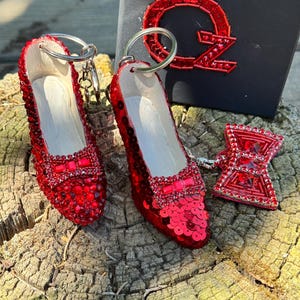 Dorothys Ruby slippers the wizard of Oz bag charms with bow