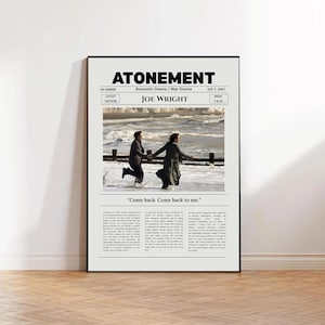 May include: A framed movie poster for Atonement featuring the title, director Joe Wright, and a central photograph of two people running along a beach. The poster includes the quote Come back. Come back to me. and descriptive text blocks.
