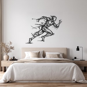 May include: A black metal wall art piece depicting a stylized, abstract figure of a person in a dynamic running pose. The design features thin, flowing lines and sharp angles that create a sense of motion and speed across the wall surface.