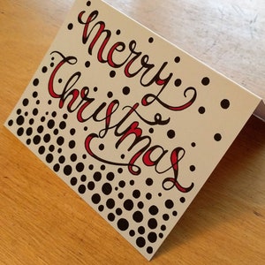 Vrolijke kerstkaart, Happy Holidays-kaart, handgemaakte kaart, blanco wenskaart, typografie kalligrafiekaart, gevouwen kerstkaart