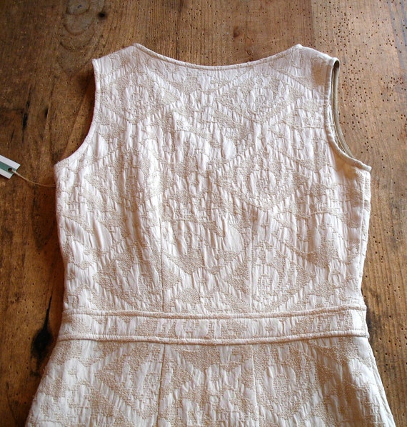 cream mid length dress
