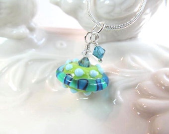 Necklace glass pendant blue green lampwork saucer shape in ocean shades, crystals, bead by Desert Bug